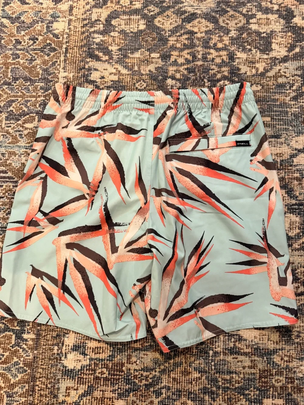 O'Neill Mint Blue Tropical Print Swim Shorts with Coral and Black Accents